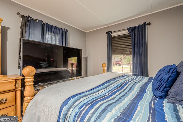 bedroom with ornamental molding