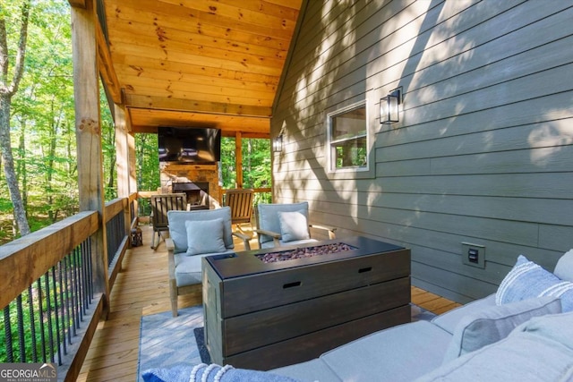 318 Lees Ride Unit 8, Mccaysville, GA 30555 - deck with an outdoor living space with a fireplace