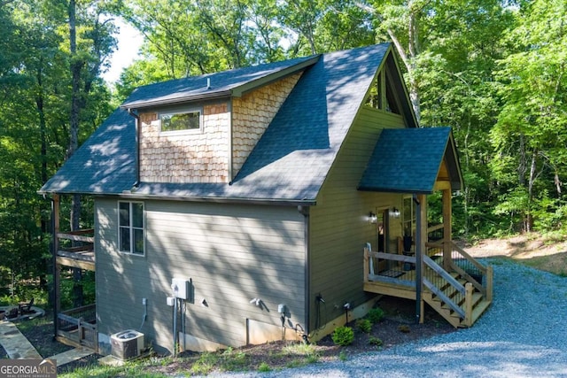 318 Lees Ride Unit 8, Mccaysville, GA 30555 - view of home's exterior with central air condition unit and a shingled roof
