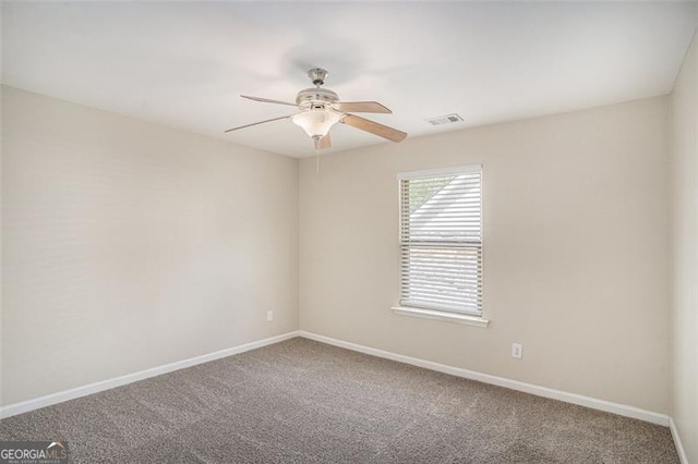3459 Village Park Ln, Atlanta, GA 30331 - carpeted spare room with visible vents, baseboards, and ceiling fan