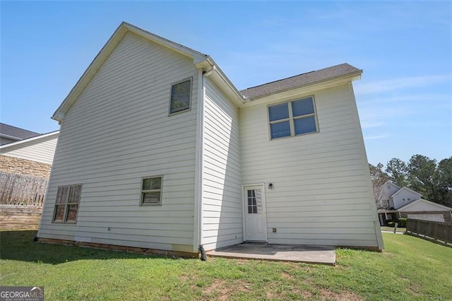 3459 Village Park Ln, Atlanta, GA 30331 - rear view of property featuring a yard, fence, and a patio