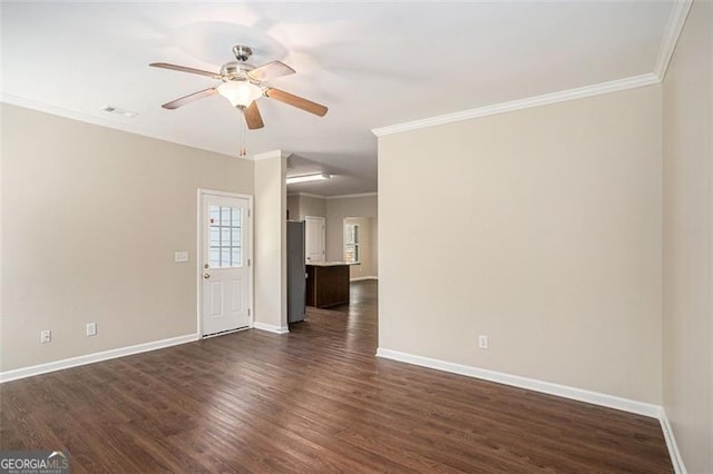 3459 Village Park Ln, Atlanta, GA 30331 - unfurnished living room with crown molding, baseboards, and dark wood finished floors