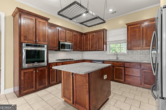 911 Larkspur Ln, Saint Marys, GA 31558 - kitchen with light tile patterned floors, visible vents, a sink, and appliances with stainless steel finishes