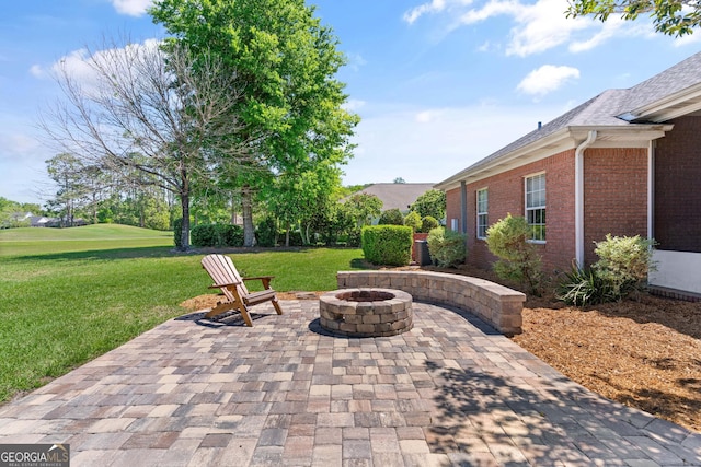 911 Larkspur Ln, Saint Marys, GA 31558 - view of patio with a fire pit