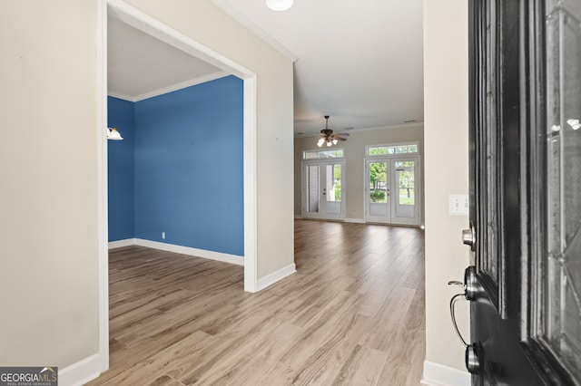 911 Larkspur Ln, Saint Marys, GA 31558 - foyer featuring baseboards, crown molding, a ceiling fan, and wood finished floors