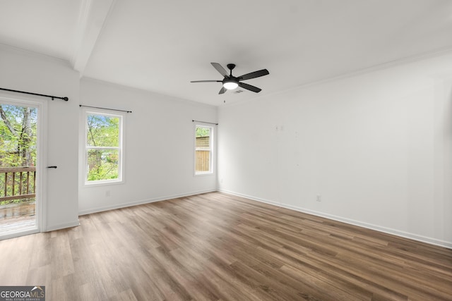 1536 Bluff Valley Cir, Gainesville, GA 30504 - spare room with plenty of natural light, wood finished floors, baseboards, a ceiling fan, and crown molding