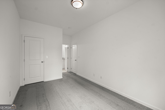 1536 Bluff Valley Cir, Gainesville, GA 30504 - unfurnished bedroom featuring baseboards and carpet floors