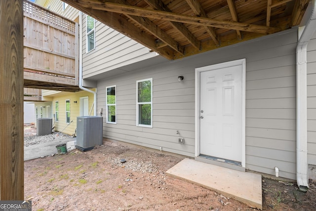 doorway to property with central air condition unit
