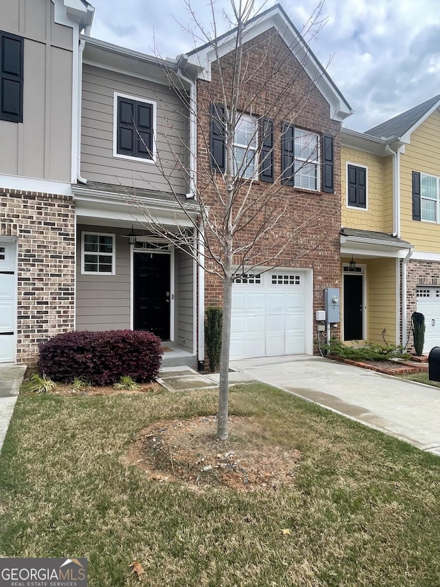 1536 Bluff Valley Cir, Gainesville, GA 30504 - view of property with a garage, brick siding, concrete driveway, and a front lawn