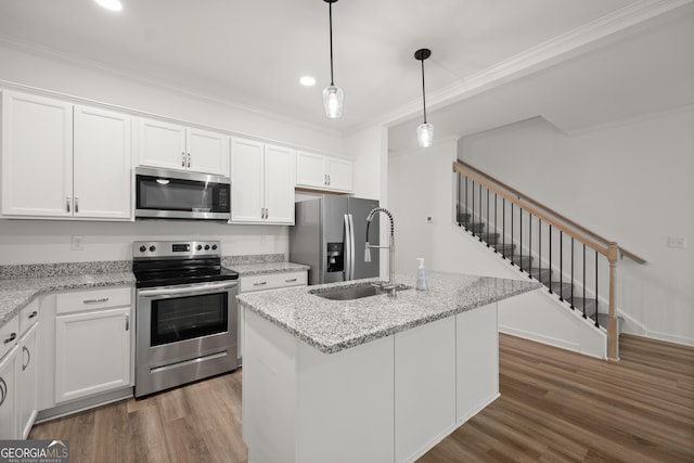 1536 Bluff Valley Cir, Gainesville, GA 30504 - kitchen featuring stainless steel appliances, a sink, ornamental molding, white cabinetry, and dark wood-style flooring