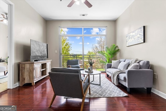 711 Cosmopolitan Dr NE Unit 347, Atlanta, GA 30324 - living room with visible vents, baseboards, a ceiling fan, and wood finished floors