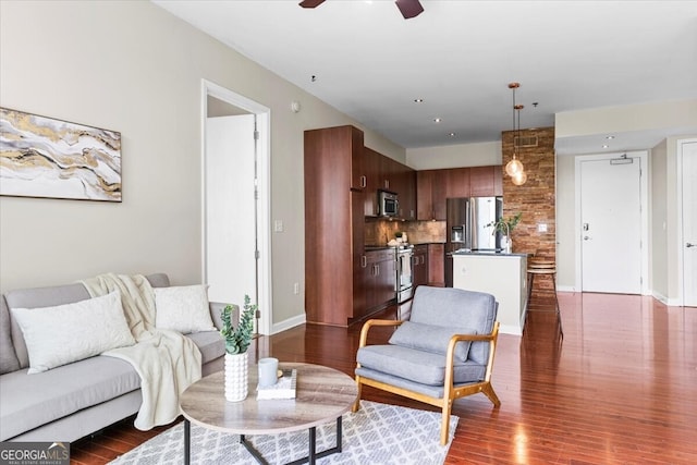 711 Cosmopolitan Dr NE Unit 347, Atlanta, GA 30324 - living area featuring baseboards, a ceiling fan, and dark wood finished floors