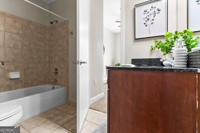 711 Cosmopolitan Dr NE Unit 347, Atlanta, GA 30324 - bathroom featuring baseboards, toilet, shower / bath combination, vanity, and tile patterned floors