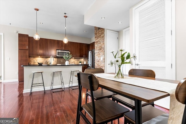 711 Cosmopolitan Dr NE Unit 347, Atlanta, GA 30324 - dining space featuring recessed lighting and dark wood-style floors