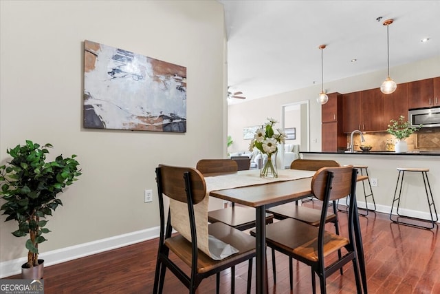 711 Cosmopolitan Dr NE Unit 347, Atlanta, GA 30324 - dining room featuring baseboards, a ceiling fan, and dark wood-style floors