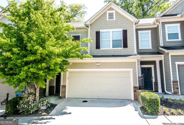 1058 Mays Hl, Atlanta, GA 30336 - view of front of home featuring driveway and a garage