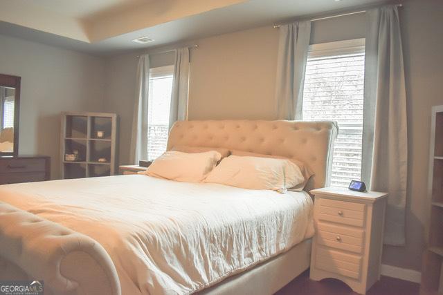 1058 Mays Hl, Atlanta, GA 30336 - bedroom featuring multiple windows
