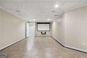 interior space featuring recessed lighting, baseboards, and ornamental molding