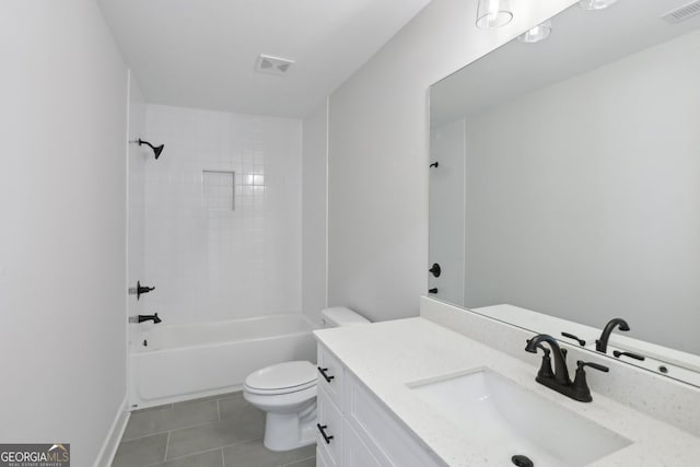 bathroom featuring toilet, tile patterned floors, vanity, and visible vents