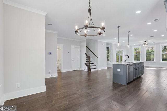 kitchen with open floor plan, gray cabinetry, visible vents, dishwasher, and a sink