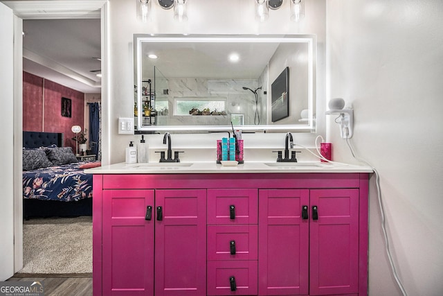 196 Wadley St NW, Atlanta, GA 30314 - full bathroom with double vanity, ensuite bathroom, wood finished floors, and a shower