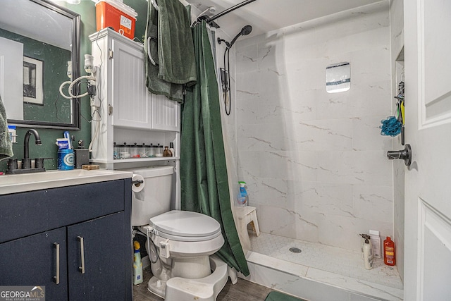 196 Wadley St NW, Atlanta, GA 30314 - bathroom featuring vanity, a shower stall, and wood finished floors