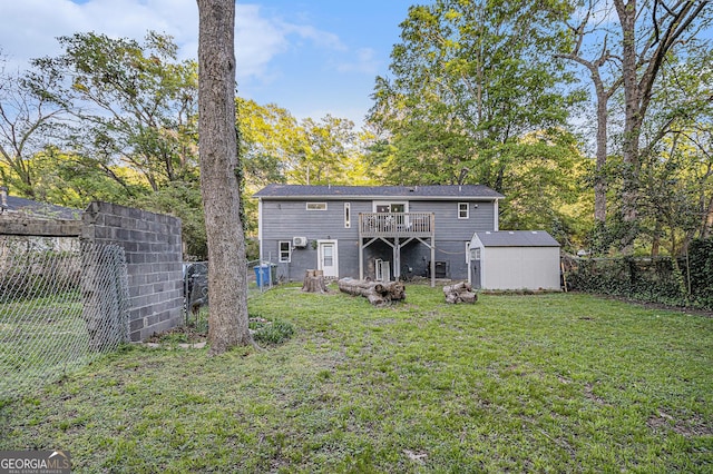 196 Wadley St NW, Atlanta, GA 30314 - back of house featuring a storage shed, a wooden deck, and a fenced backyard