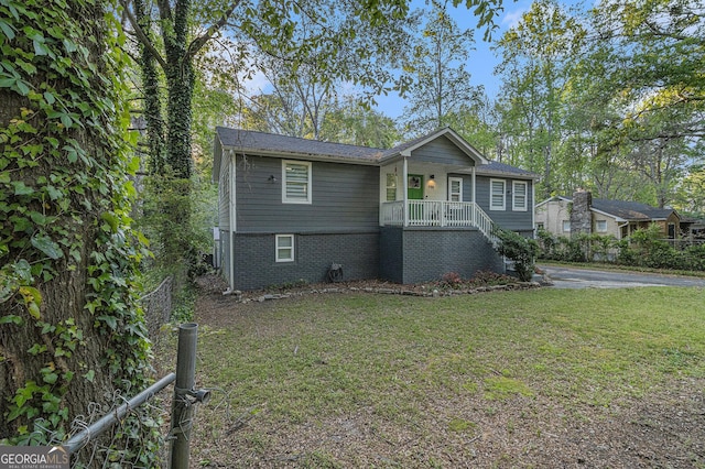196 Wadley St NW, Atlanta, GA 30314 - ranch-style home featuring covered porch and brick siding