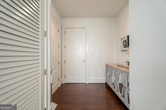 1065 Peachtree St NE Unit 2803, Atlanta, GA 30309 - corridor featuring dark wood-type flooring and baseboards
