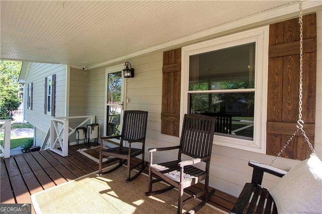 wooden deck with a porch