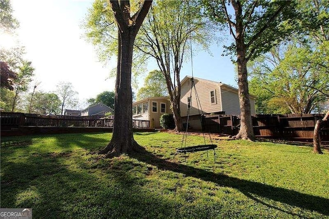 view of yard with a fenced backyard