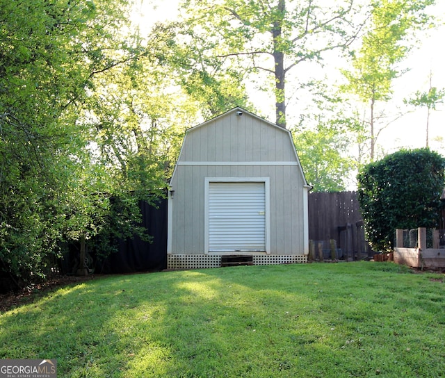 view of shed with fence