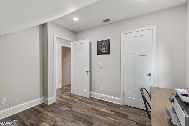 office space featuring baseboards, visible vents, recessed lighting, and dark wood-style floors