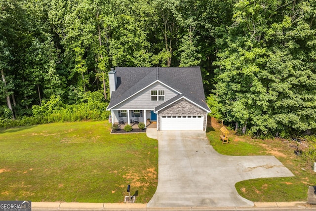 craftsman house with a shingled roof, stone siding, a garage, concrete driveway, and a front lawn