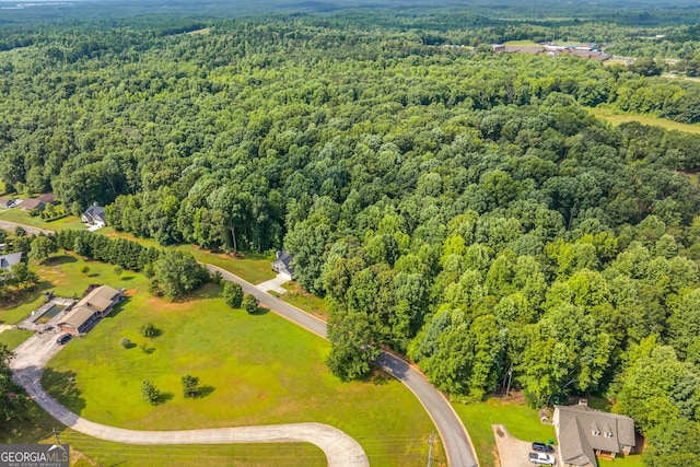drone / aerial view with a forest view