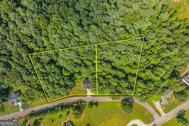 aerial view featuring a forest view