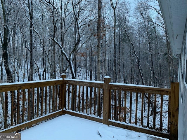 view of snow covered deck