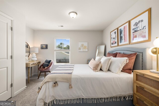 38 Buckingham Ln Unit 232, Hoschton, GA 30548 - bedroom featuring visible vents, baseboards, and light carpet