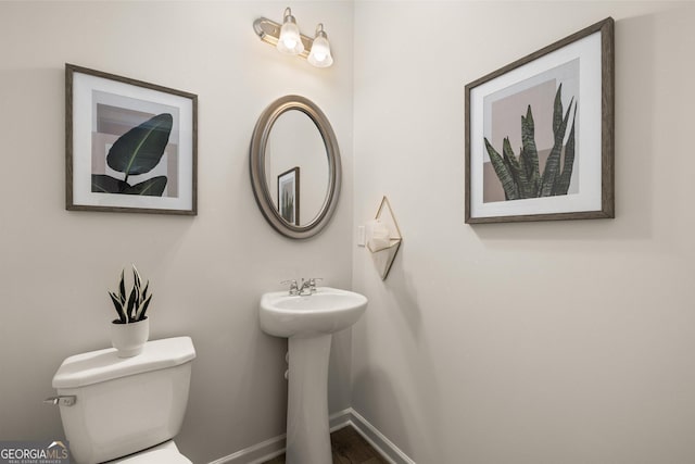 38 Buckingham Ln Unit 232, Hoschton, GA 30548 - bathroom featuring toilet and baseboards