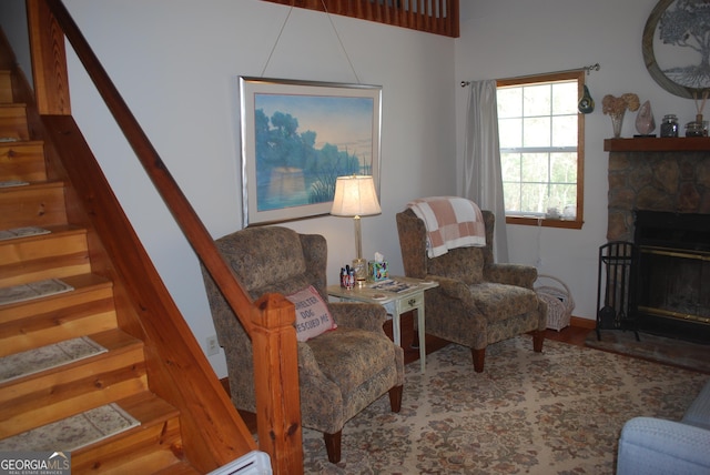 249 Spruce Creek Rd, Lakemont, GA 30552 - living area featuring stairs, a fireplace, and wood finished floors