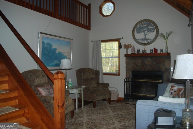249 Spruce Creek Rd, Lakemont, GA 30552 - living area with stairway, vaulted ceiling, and a fireplace