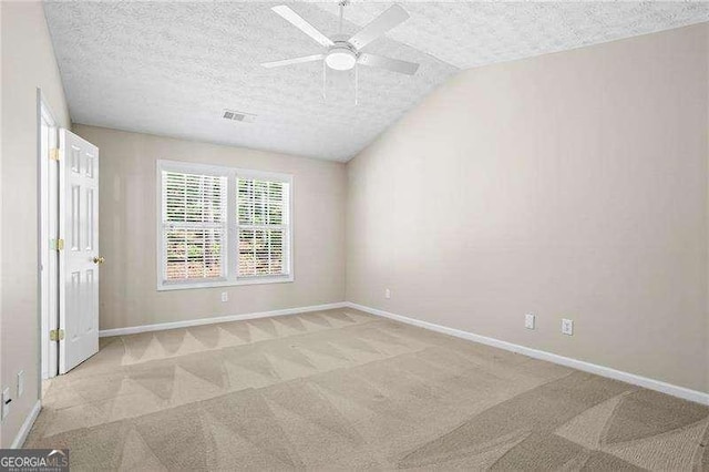 unfurnished bedroom featuring visible vents, baseboards, carpet flooring, and a textured ceiling