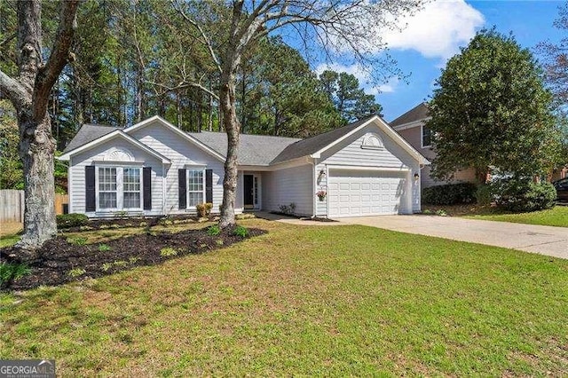 ranch-style home featuring a garage, a front yard, and concrete driveway