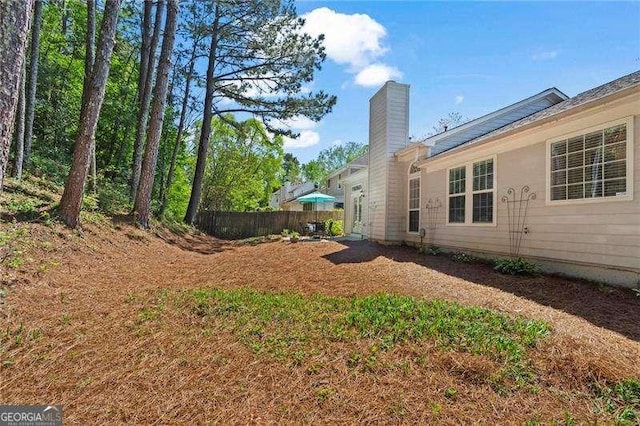 view of yard with fence
