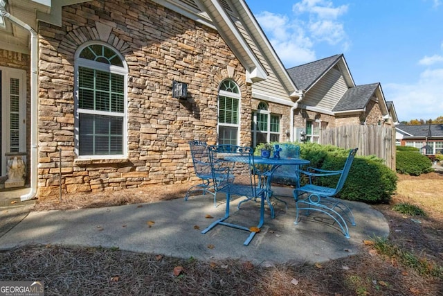 4573 Caleb Xing Unit 20, Powder Springs, GA 30127 - view of patio / terrace with fence and outdoor dining area