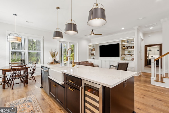 105 Whispering Oaks Ln, Saint Marys, GA 31558 - kitchen featuring visible vents, ceiling fan, dishwasher, beverage cooler, and a sink