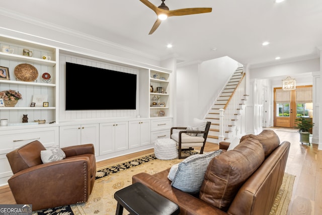 105 Whispering Oaks Ln, Saint Marys, GA 31558 - living area featuring light wood-style floors, ornamental molding, recessed lighting, stairway, and built in shelves