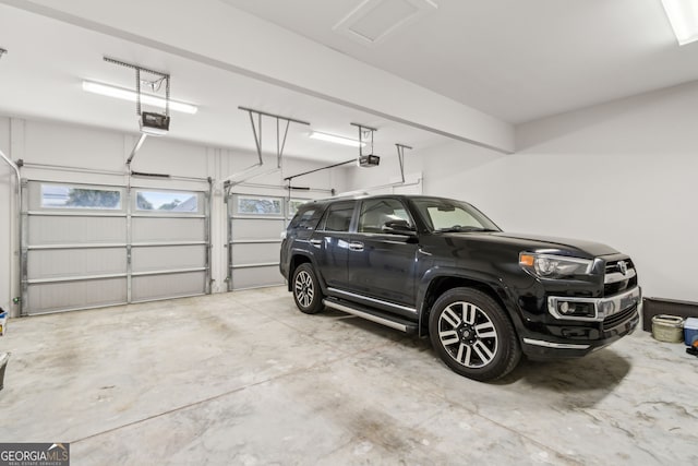 105 Whispering Oaks Ln, Saint Marys, GA 31558 - garage with a garage door opener