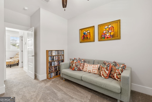 105 Whispering Oaks Ln, Saint Marys, GA 31558 - carpeted living room featuring visible vents, baseboards, and a ceiling fan