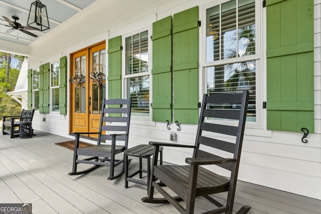 105 Whispering Oaks Ln, Saint Marys, GA 31558 - deck featuring ceiling fan and covered porch